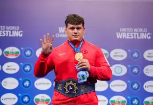 Güreşte Olimpiyat madalyası için el ele verdiler